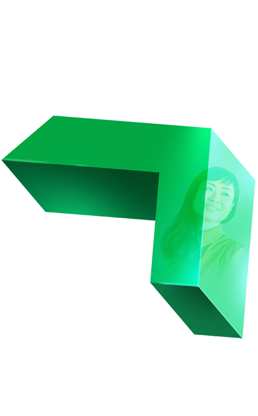 A green, three‑dimensional geometric shape with reflective surfaces.