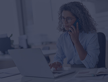 Woman on the phone and laptop