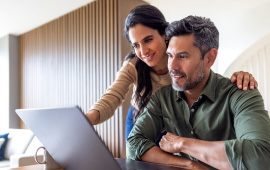 Women and man looking at labtop