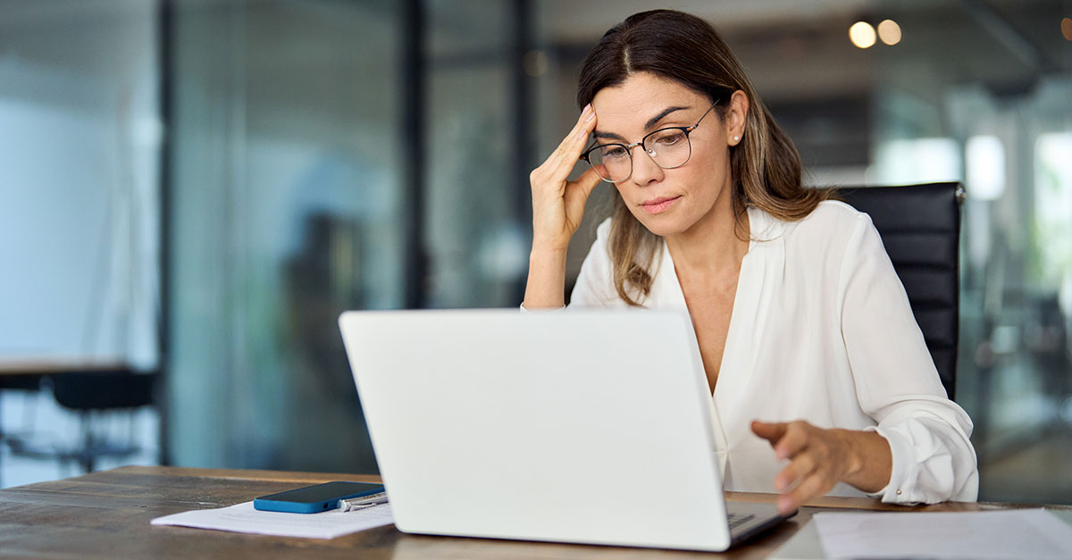 Person looking at their laptop