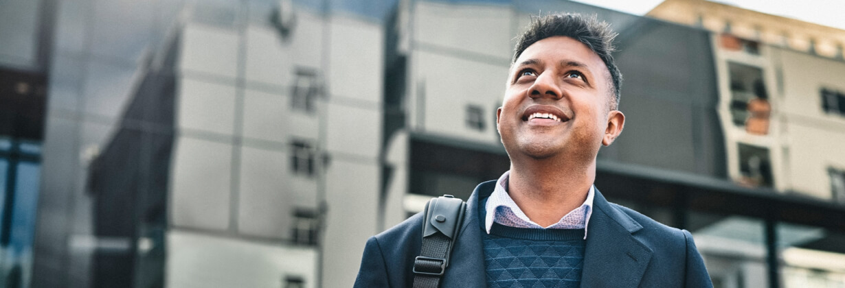 Man smiling outside